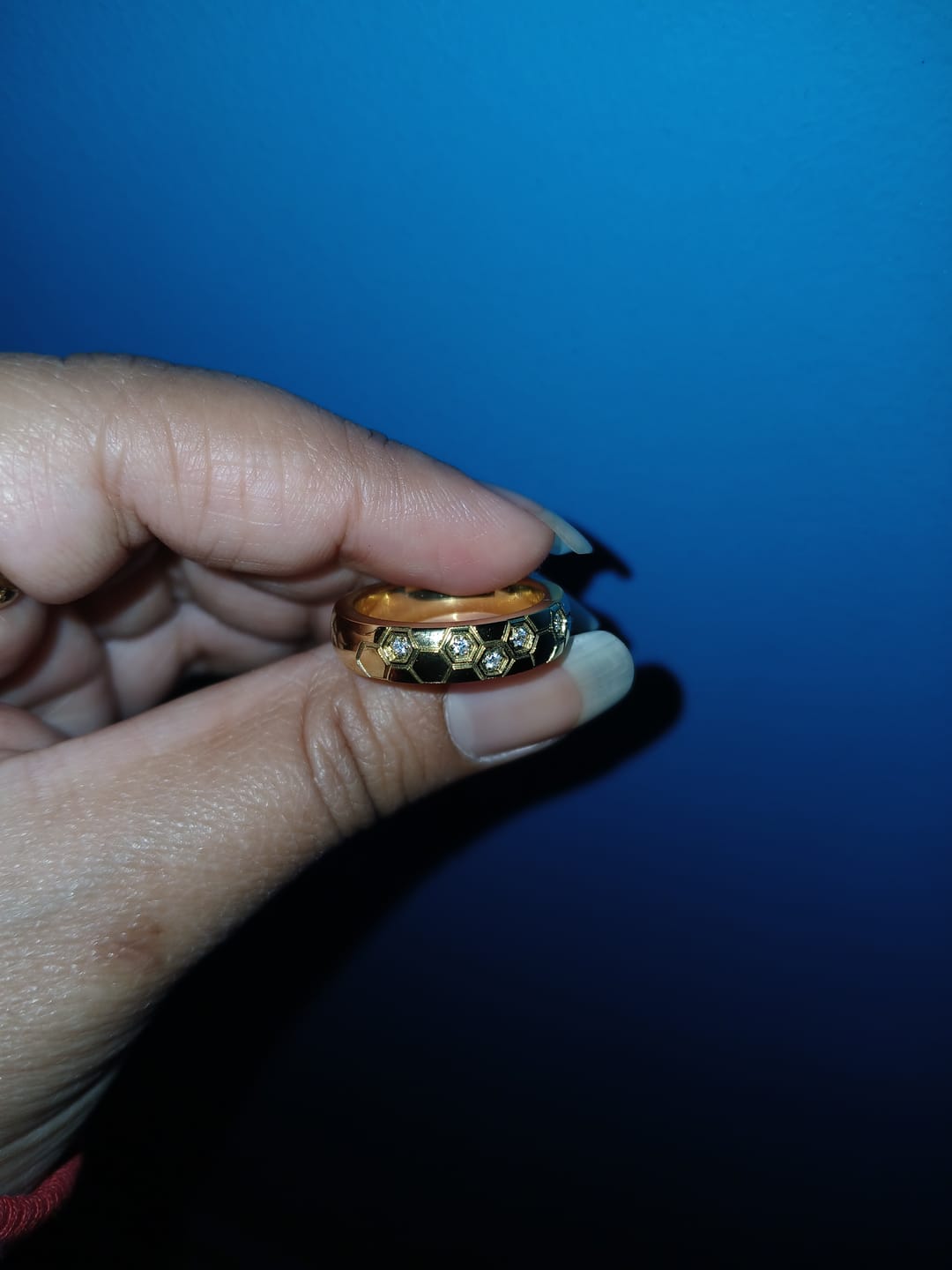 Customer photo review of Shiny Honeycomb Band Ring