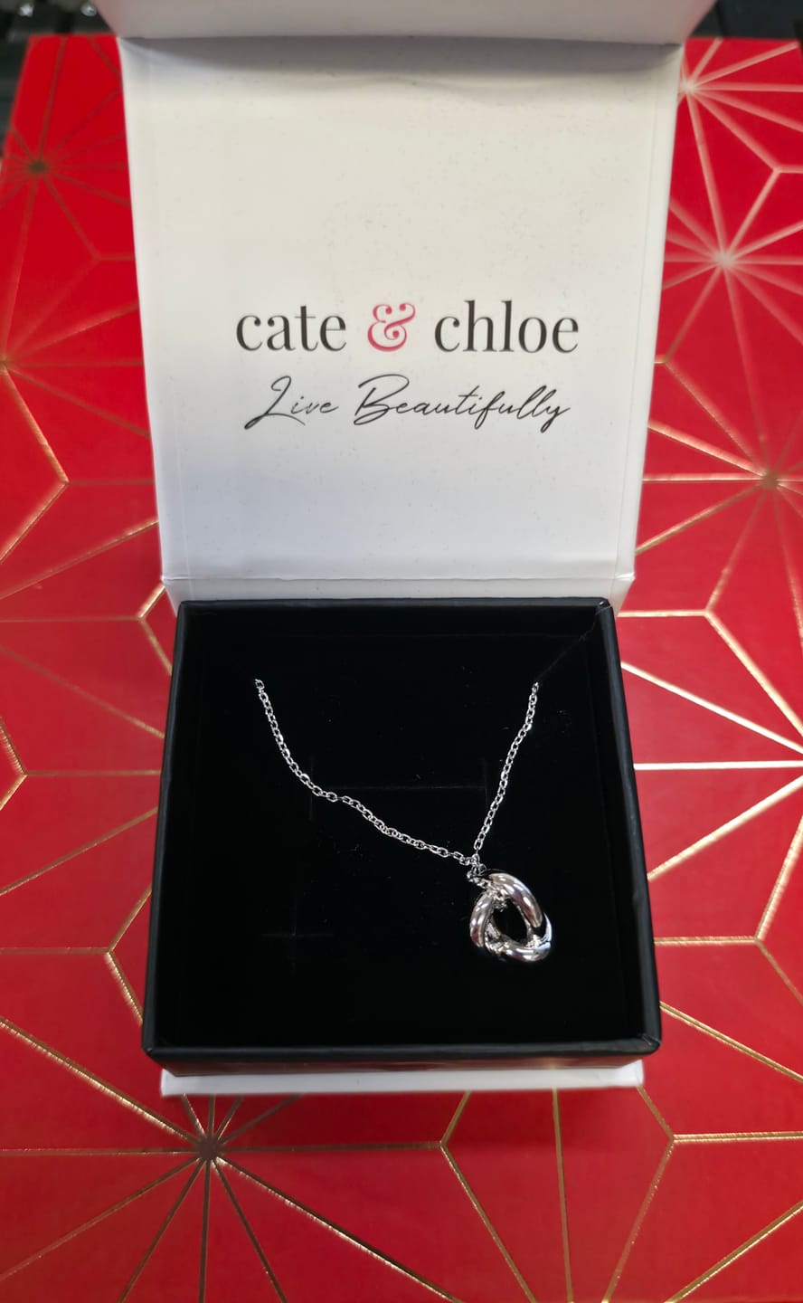 Customer photo review of Ashley 18k White Gold Plated Knot Pendant Necklace