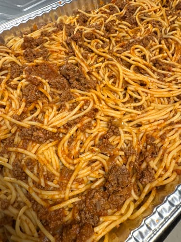 Customer's large pan of spaghetti prepared with the Halal Veal Ground Meat.