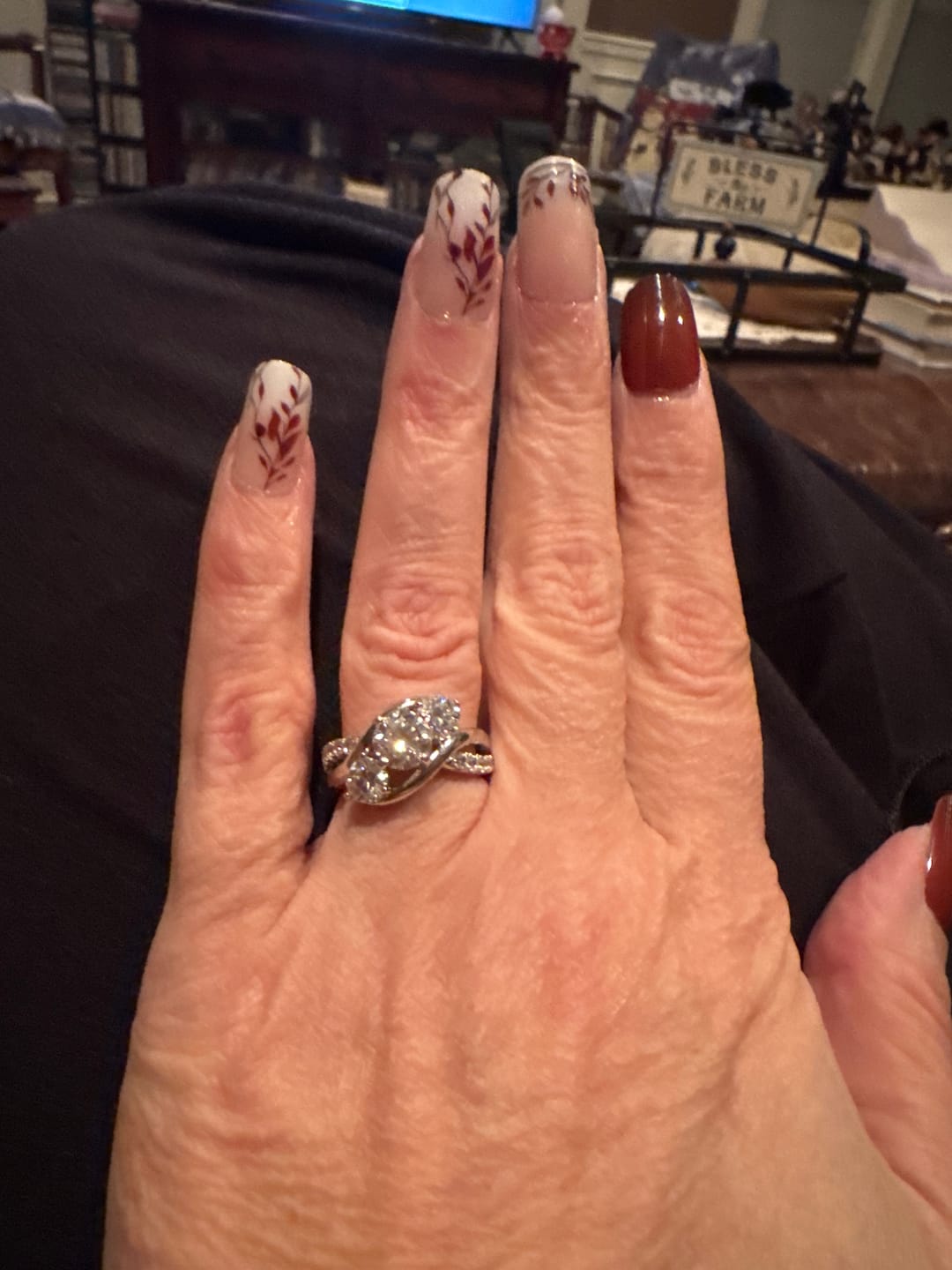 Customer photo review of Swirl Three Stone Moissanite Twisted Pave Engagement Ring