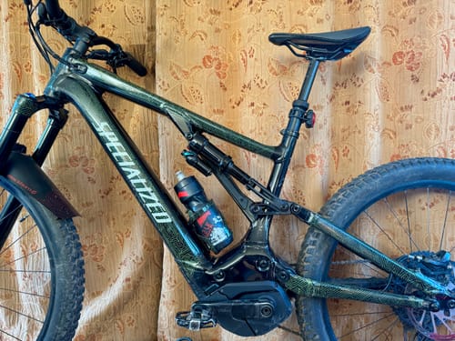 Reviewer's dark Specialized bike with the green patterned Maze Runner Frame Keeper applied to the frame.