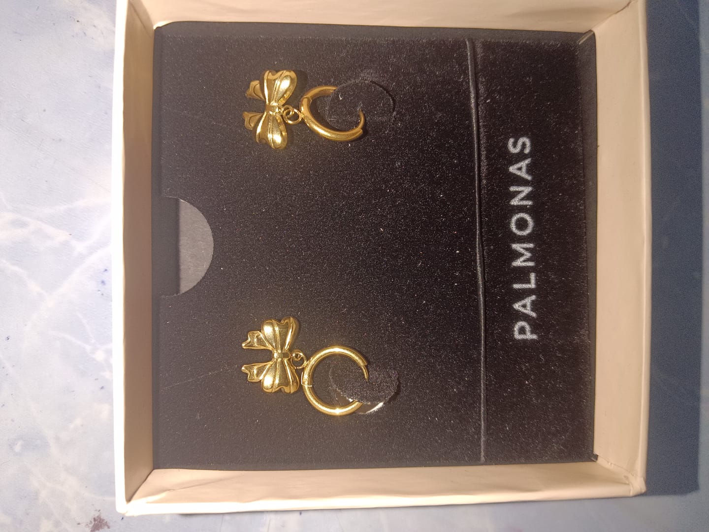 Customer photo review of Golden Bow Charm Hoop Earrings