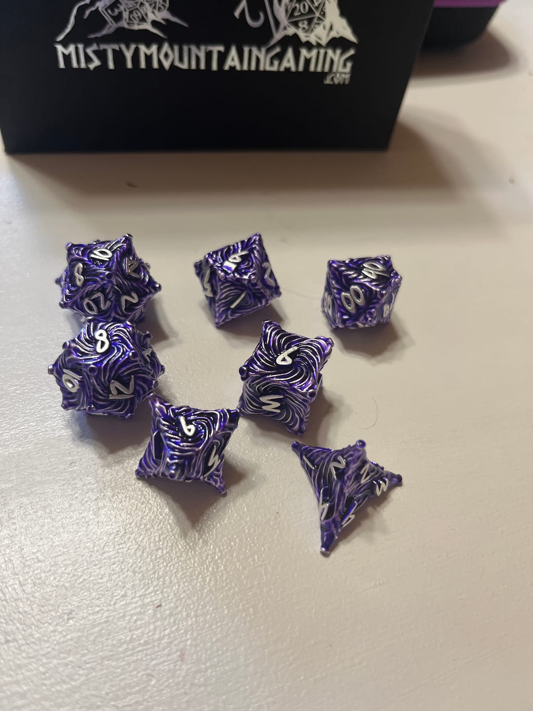 Customer photo review of Vortex Warp Metal Dice Set - Purple