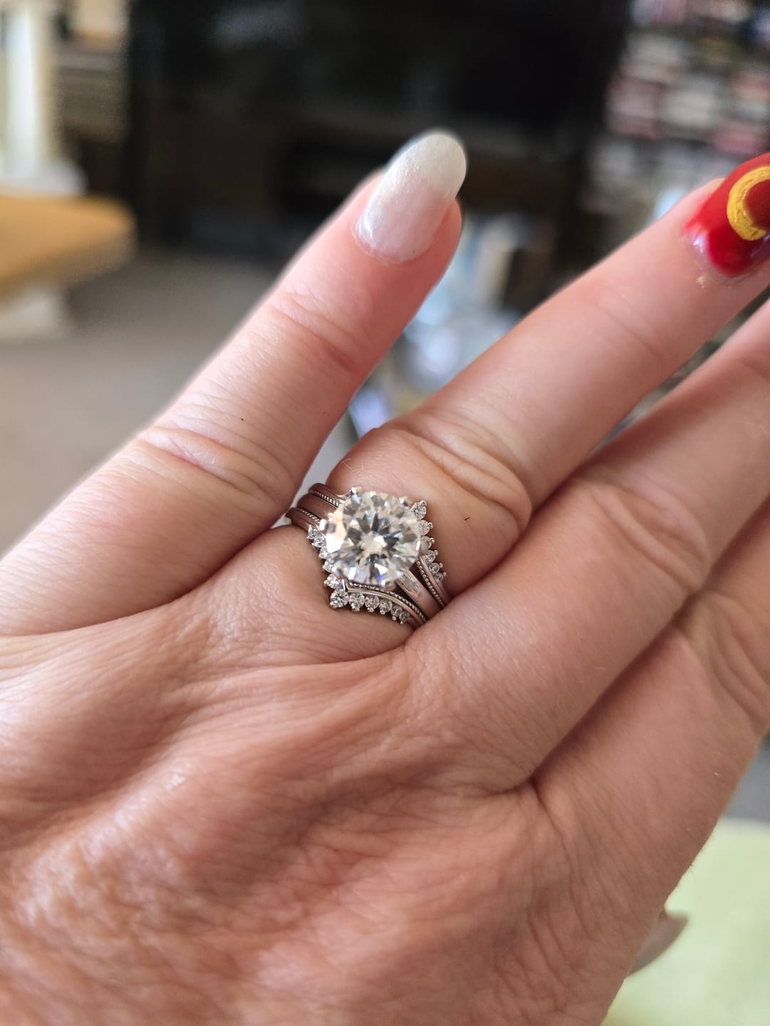Customer photo review of Solitaire Moissanite With Enhancer Shank Bridal Engagement Ring Set