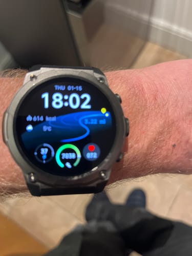 Customer's Gard Pro Ultra 3 smartwatch on their wrist, showing time and fitness metrics on its active display.