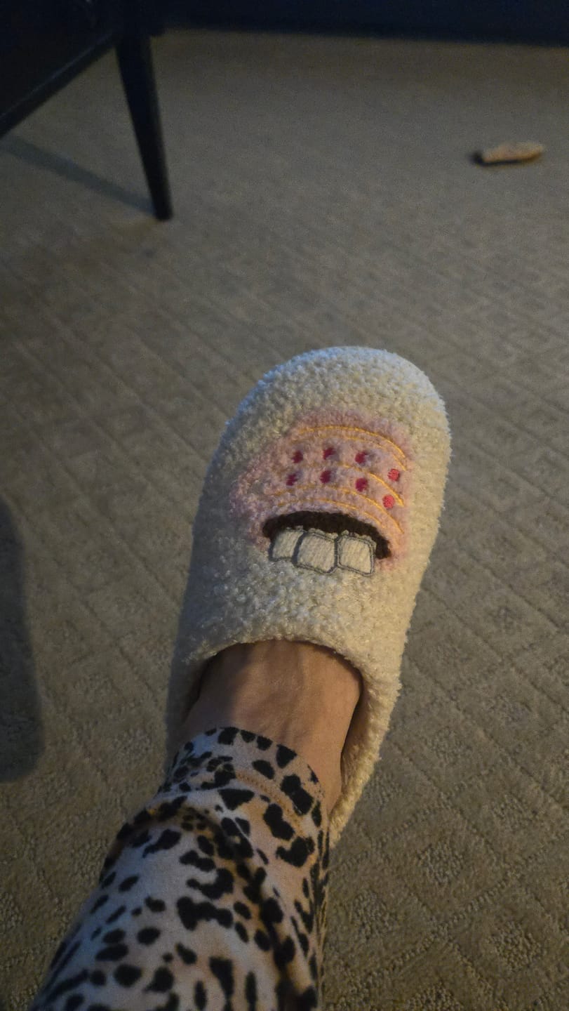Customer photo review of Candy Cane Christmas Slippers