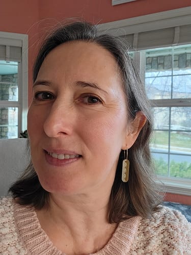 Customer photo review of Suni Hoop Earrings in Sea Foam
