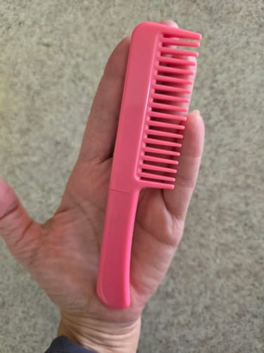 Customer photo review of Dapper Defender Self Defense Brush Comb Knife