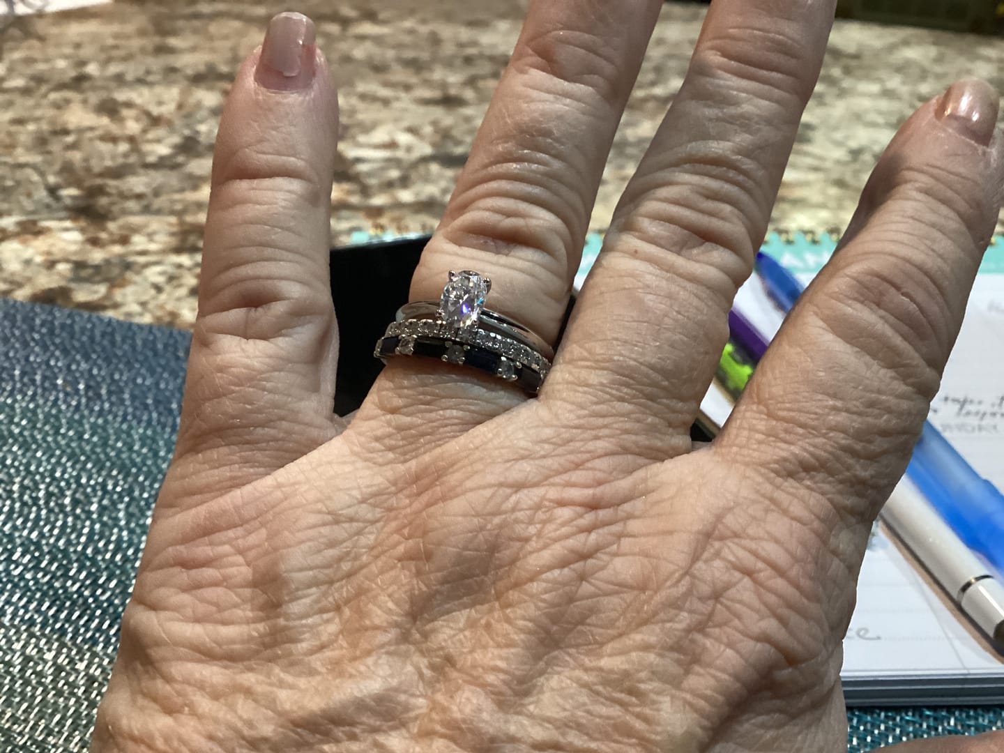 Customer photo review of Classic Solitaire Oval Moissanite Four Prong Polish Engagement Ring