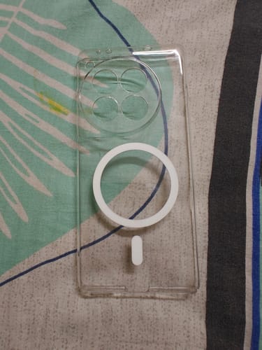 Customer's clear Anti Yellow Magsafe case for the One Plus 12, showing its transparent body and white magnetic ring.