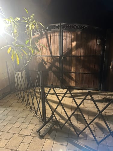 Customer photo review of FairyBaby Foldable & Retractable Extra Wide Pet Dog Safety Gate with Wheels, Expandable Isolation Fence