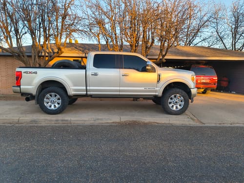 Customer's silver pickup truck with the Premium Bullet Antenna installed.