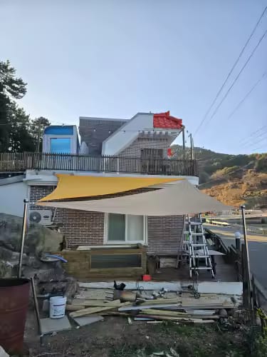 Customer photo review of Triangle Shade Sail | Saffron Yellow