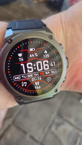 Close-up of a customer's Gard Pro Ultra 3 smartwatch on their wrist, showing a detailed digital face with health metrics.
