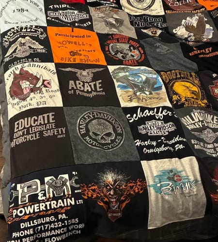 Customer's Premium T Shirt Quilt featuring a patchwork of Harley-Davidson and motorcycle event t-shirts.