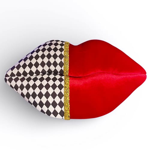 Customer's lip-shaped pillow using the Alice in Wonderland Checkered Fabric on one half and solid red fabric on the other.
