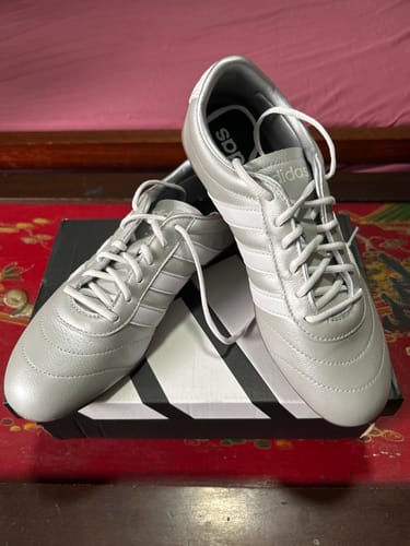 Customer's silver adidas Grand Court Lo Casual Shoes displayed on top of the shoebox.