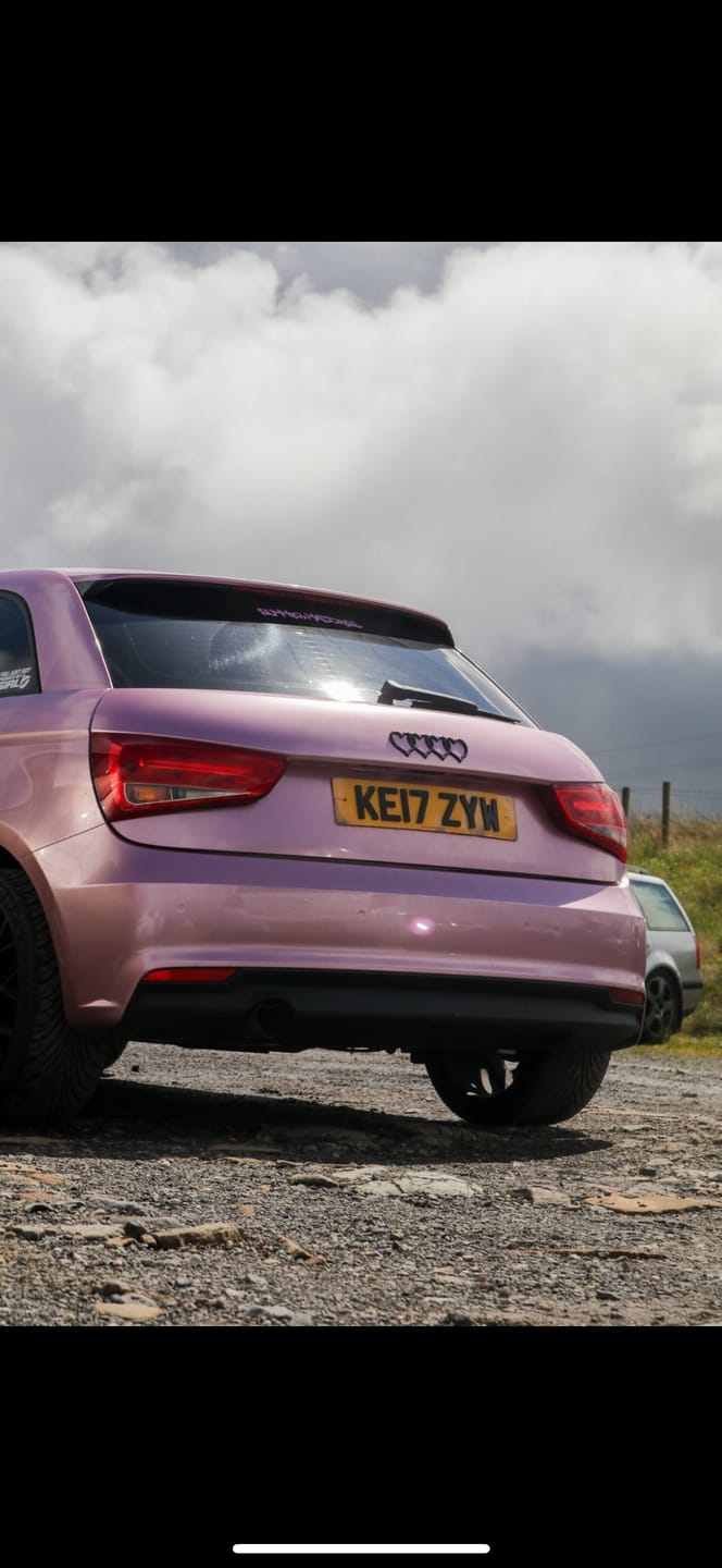 Customer photo review of Glossy Metallic Passion Pink Vinyl Wrap