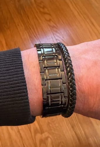Customer wearing the black, linked Paladin M109A7 Howitzer bracelet on their wrist.