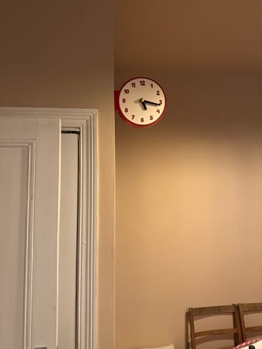 Customer photo review of Corner View Double-Sided Clock