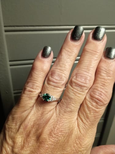 Customer photo review of Green Moissanite Side Stone Engagement Ring