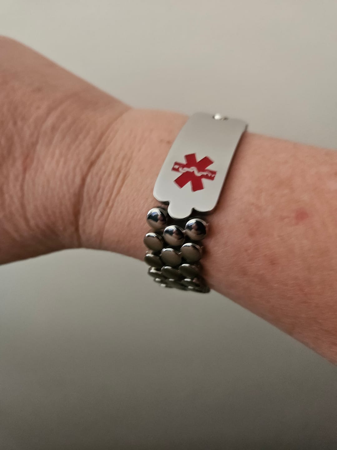 Customer photo review of SilverPulse Medical Alert Bracelet