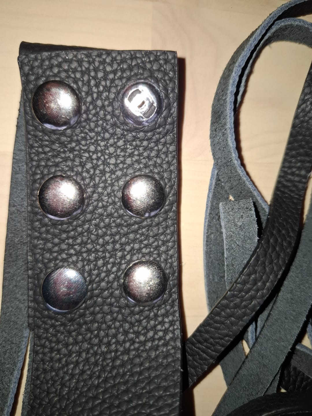 Customer photo review of Unisex Dual-Wear Leather Fringe Wrap Bracelet-Midnight Black-Flogger (Plain Black)