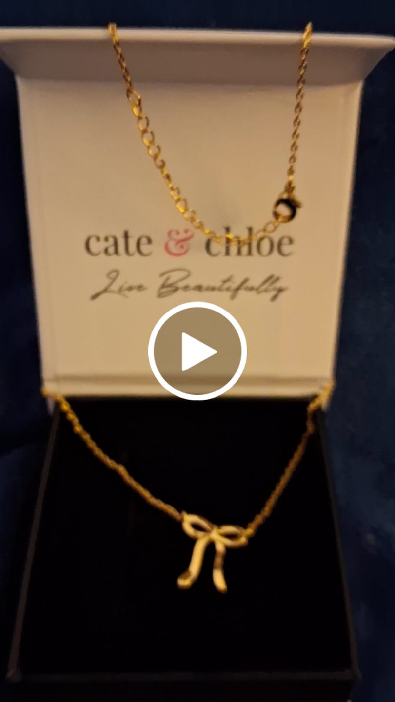Customer video review of Lola 18k White Gold Plated Ribbon/Bow Pendant Necklace