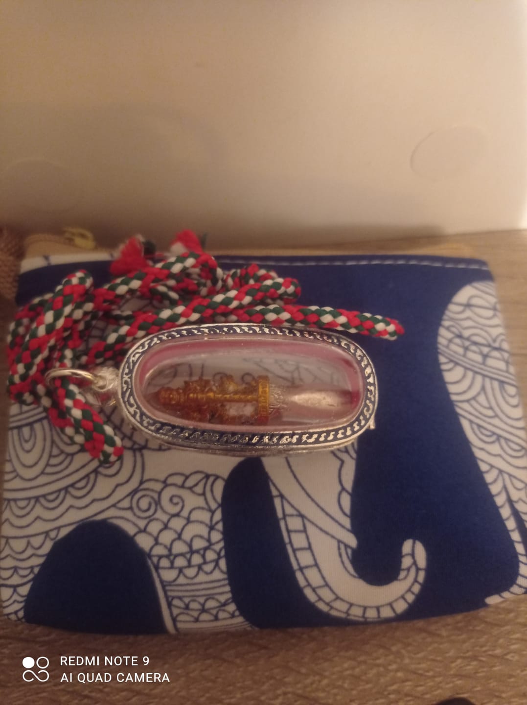 Customer photo review of Petite amulette dague rituelle Phra Karn Tao Wessuwan – Très Vénérable Luang Phor Dooh # 751