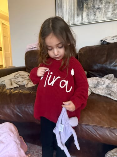 Customer photo review of Pacifier Buddy Luna the Unicorn