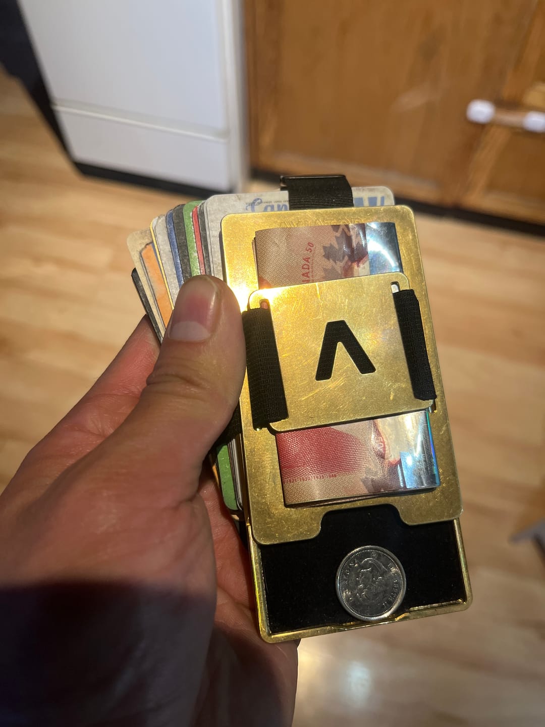 Customer photo review of Stonewashed Brass | Slide Wallet + Brass Cash Clip