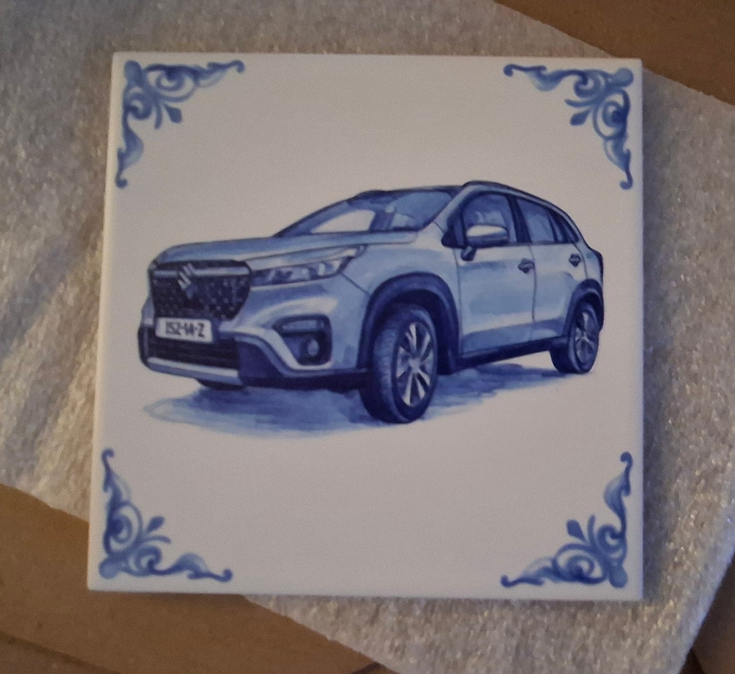 Customer photo review of Delfts Blauw tegeltje bedrukken met eigen auto