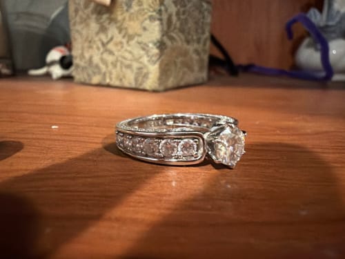 Customer photo review of Round Moissanite Triple Channel Set Engagement Ring