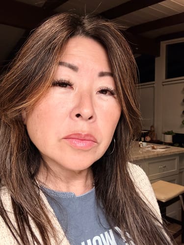 Reviewer showing the nice color from two coats of the LA LA LIPS LIP BALM in Rojo.