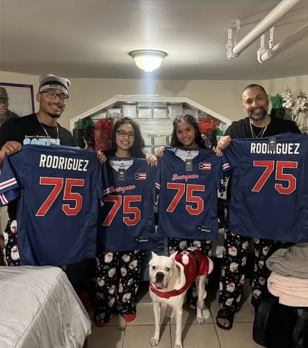 Customer's family showing off their matching blue Puerto Rico Heritage Football Jerseys, customized with 'Rodriguez' and '75'.