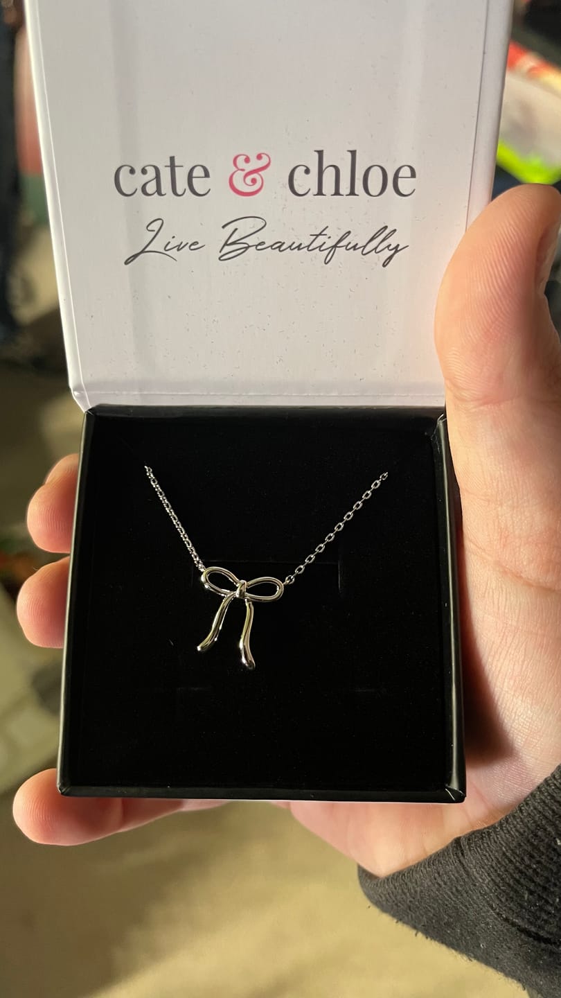 Customer photo review of Lola 18k White Gold Plated Ribbon/Bow Pendant Necklace
