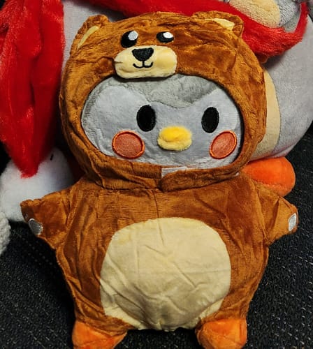 Customer photo review of Gray Mini Plushie: Small but Mighty in Care