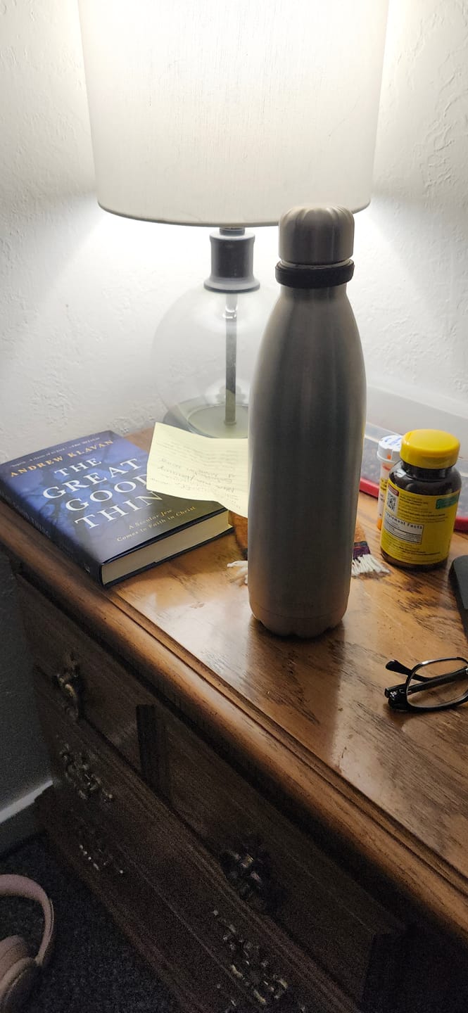 Customer photo review of Stainless Steel Double Wall Vacuum Insulated Water Bottle with Carrier Holder for Adults & Kids - 12 oz, 17 oz and 25 oz