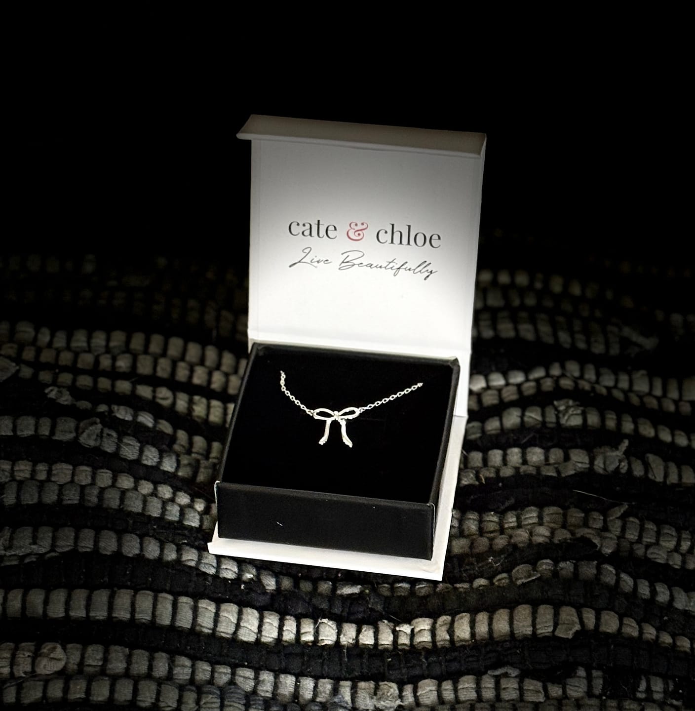 Customer photo review of Lola 18k White Gold Plated Ribbon/Bow Pendant Necklace