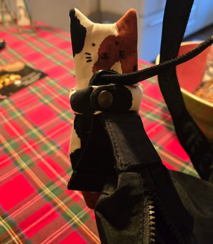 Customer photo review of Hugging Cat Zipper Pouch — Handmade Bag Charm
