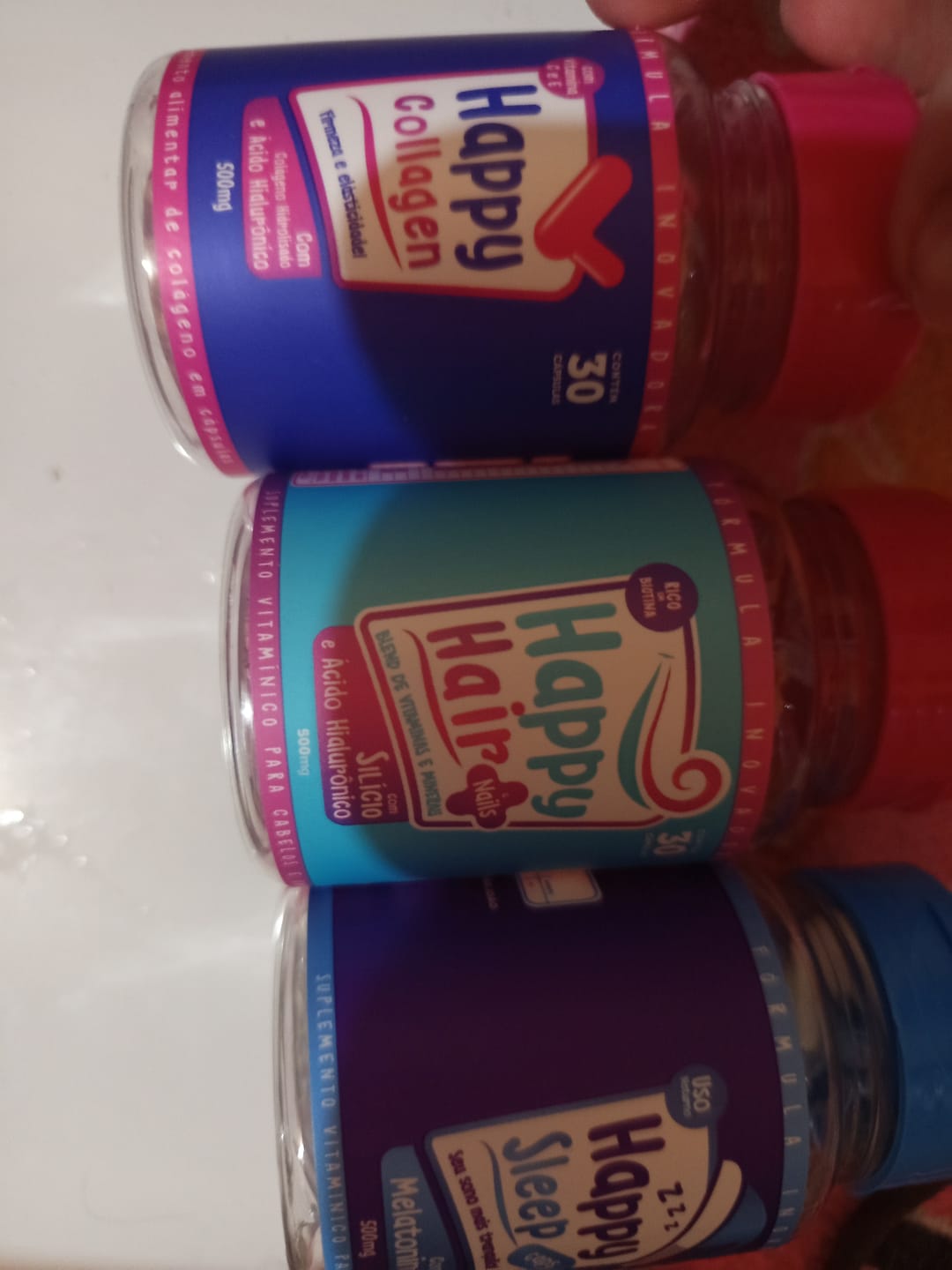 Customer photo review of Happy Hair 2 Potes + 1 Melatonina Grátis + 1 Colágeno Grátis