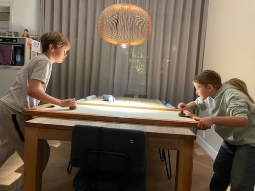 Fotorecensie van een klant over Indoor Tafel Hockey - Shuffle Puck - 130x70 cm