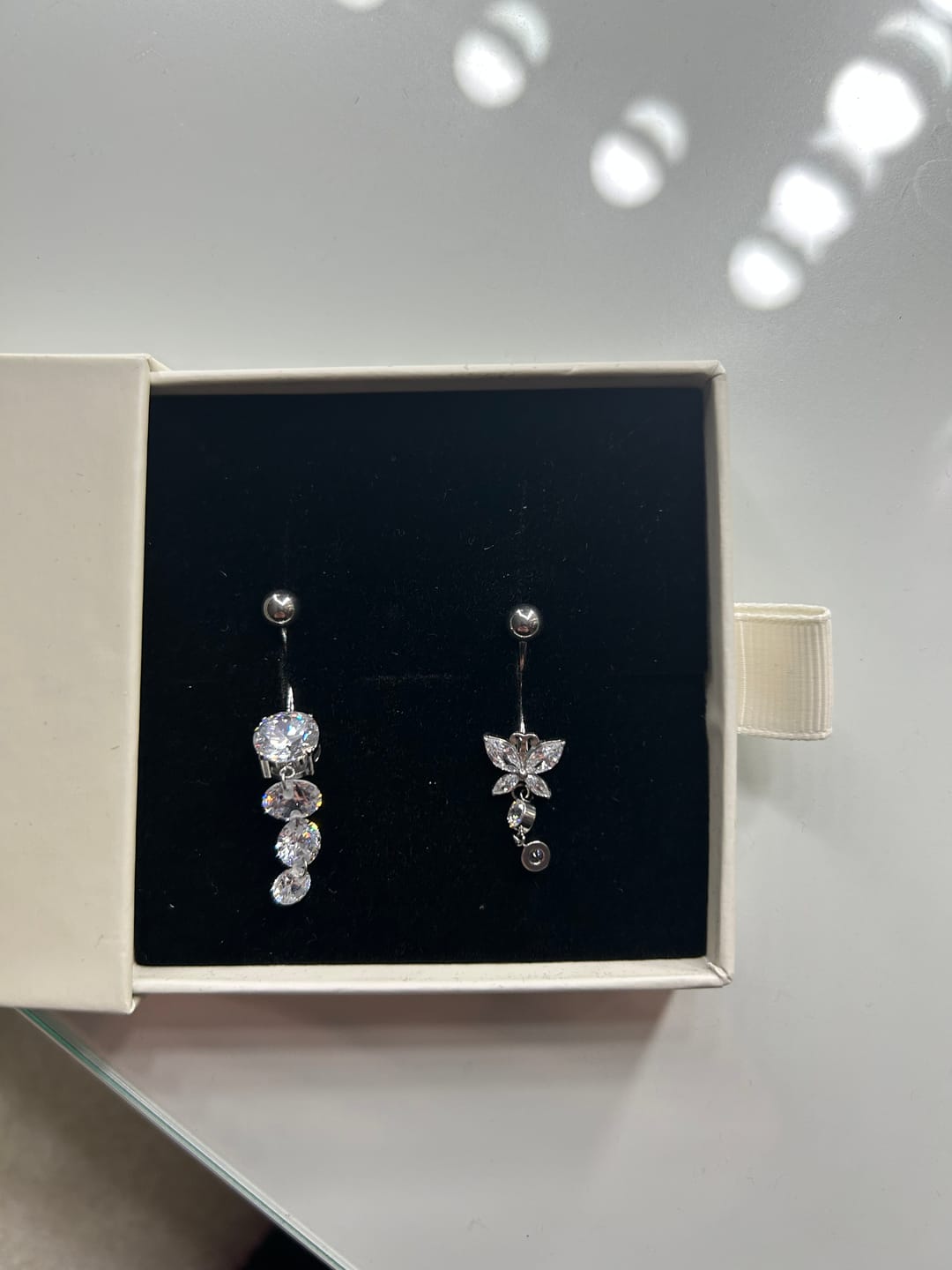 Customer photo review of Timeless Butterfly Belly Piercing - Titan