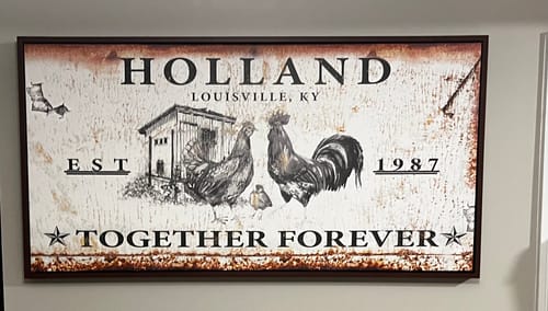 Customer's personalized rustic Chicken Coop Sign with a chicken family and coop design, hanging on a wall.