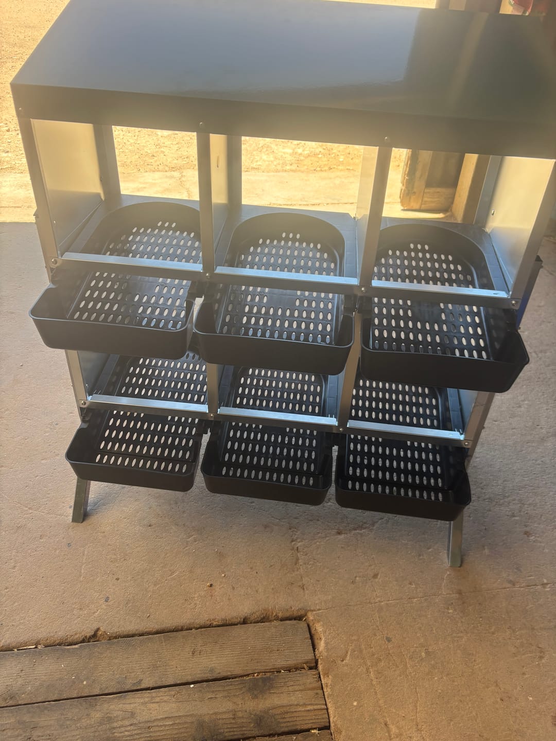 Customer photo review of Double Layer Elevated Roll Away Nest Box 6-Hole Green