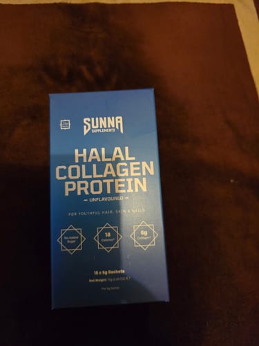 Customer displays the blue box of unflavoured Halal Collagen Protein Sachets.