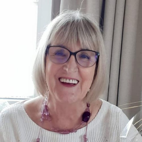 A smiling customer in a portrait for their review of the Mexican Skincare Bestseller.