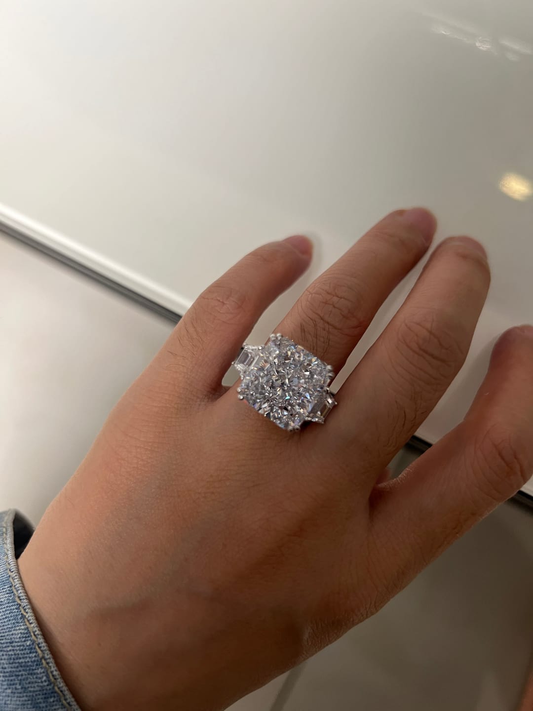 Customer photo review of S925 6.5/12.0 Ct Radiant Cut Crushed Ice Simulated Diamond Three-Stone Engagement Travel Ring