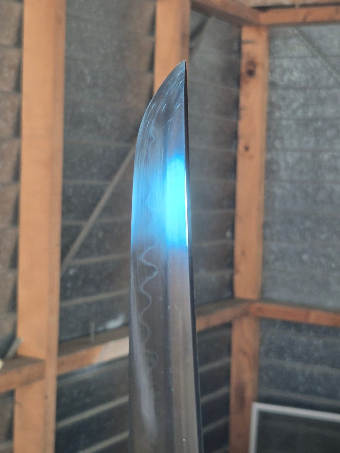 Customer photo review of The Giyuu Tomioka Handmade Katana Clay Tempered T10 Steel From Demon Slayer