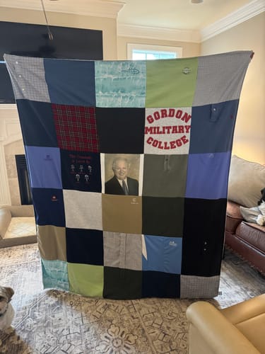 Customer's memorial Premium T Shirt Quilt made from various shirts, with a photo of a man in the center.